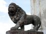 Nic - 064 * Humanized Lions flank the entrance to the Cathedral in Leon